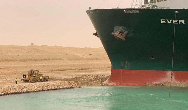 Ships seen near Suez Canal as container ship partially refloats