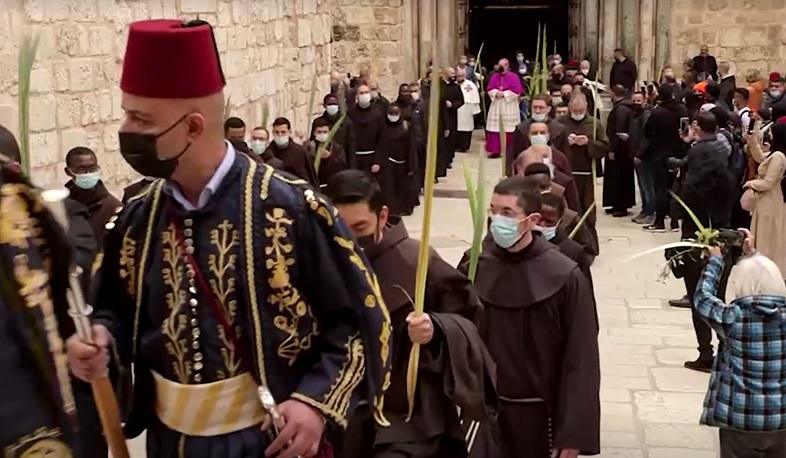 The door is open for a Palm Sunday procession in Jerusalem