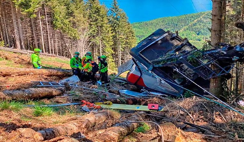 At least 14 killed as Italian cable car plunges into woodland