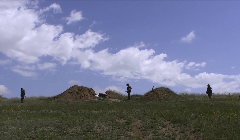 Russian peacekeepers provide security during agricultural work along the line of demarcation in Nagorno-Karabakh