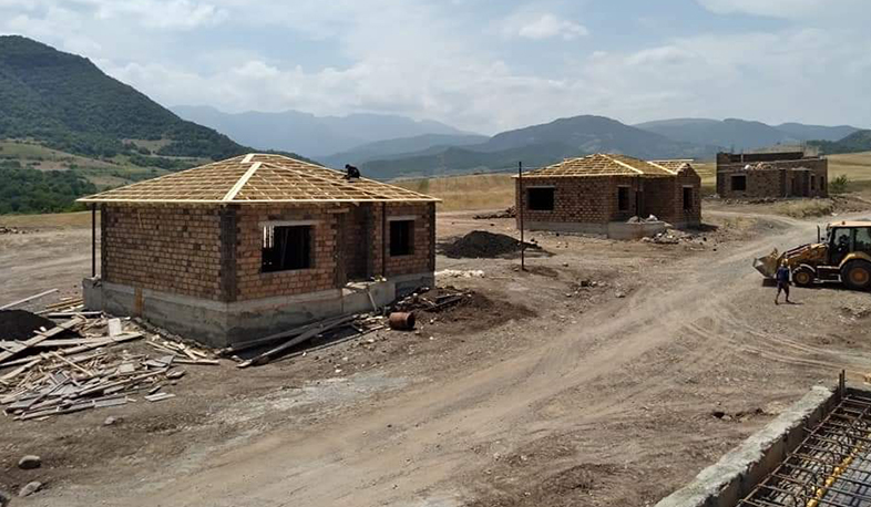 Private houses under construction in Astghashen are being roofed for displaced residents of Artsakh