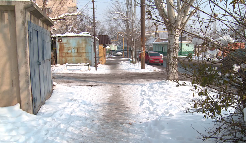 Streets, sidewalks and yards all covered with ice