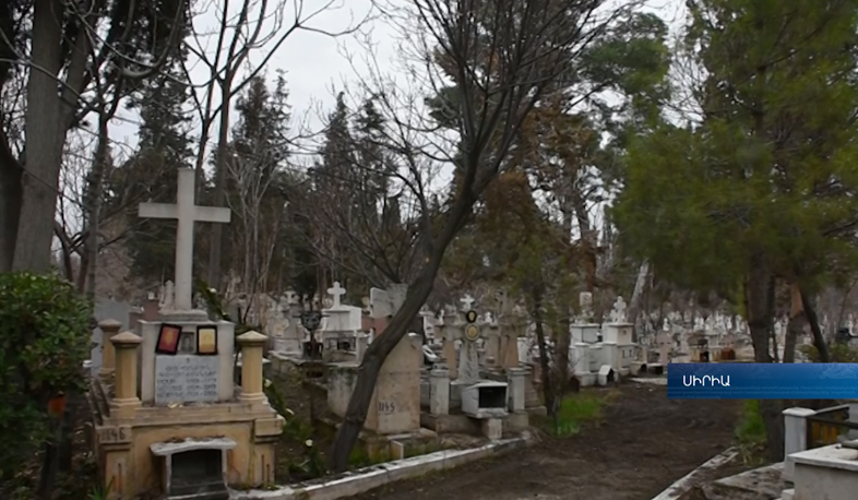 Incense smoke spreads over Armenian cemetery in Aleppo