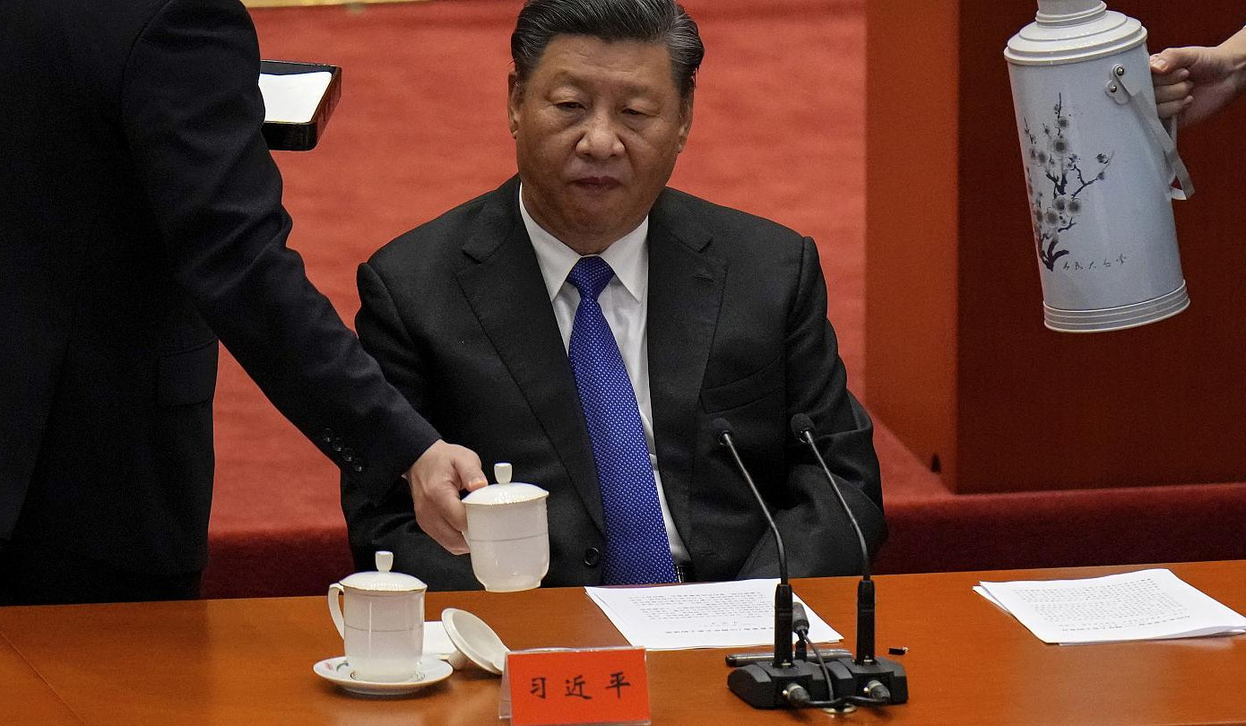 Xi vows Taiwan ‘reunification’, but holds off threat of force