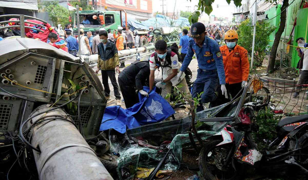 Trailer truck crashes into schoolchildren near Jakarta, killing at least 10 people