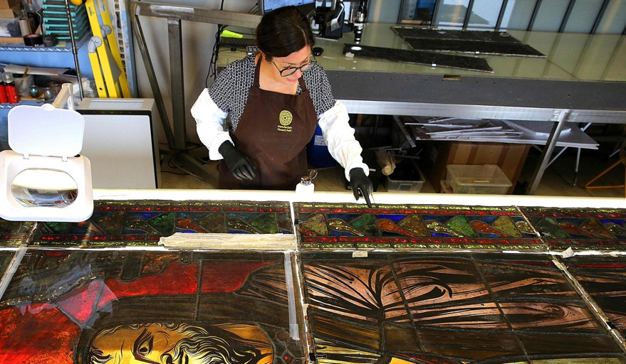 French artisans restore Notre-Dame stained glass windows soiled in fire