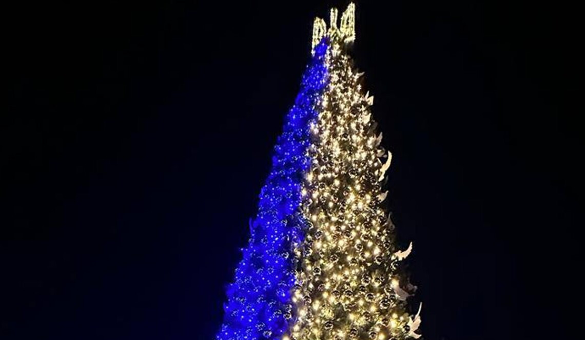 Powered by generators, Christmas tree sparkles in dark Kyiv