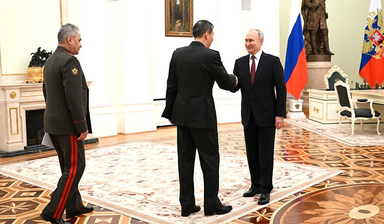 US-sanctioned Chinese defense minister meets Putin in Moscow