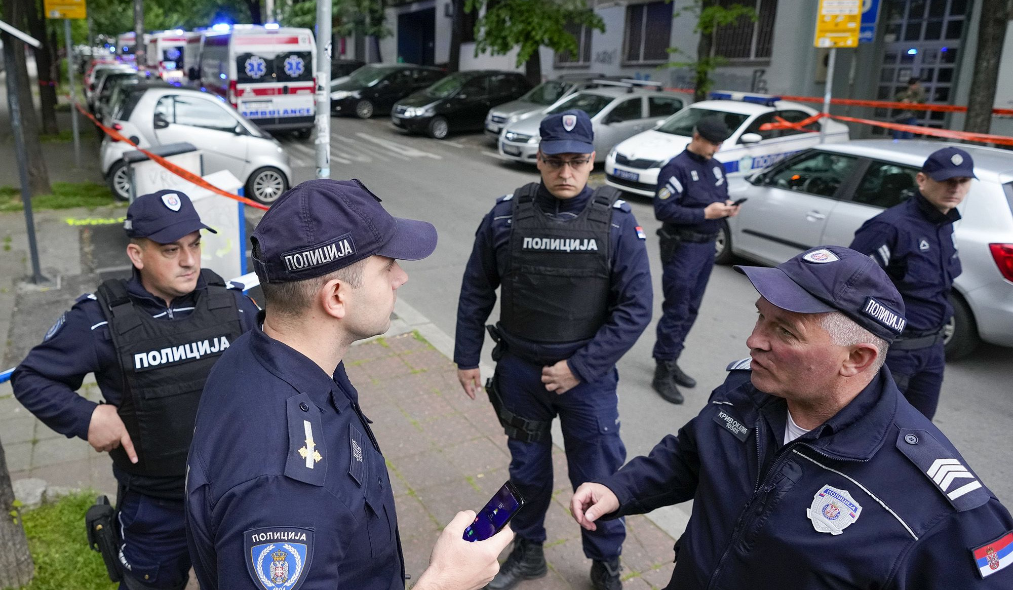 Teacher and security guard killed after schoolboy allegedly opens fire at Serbian school