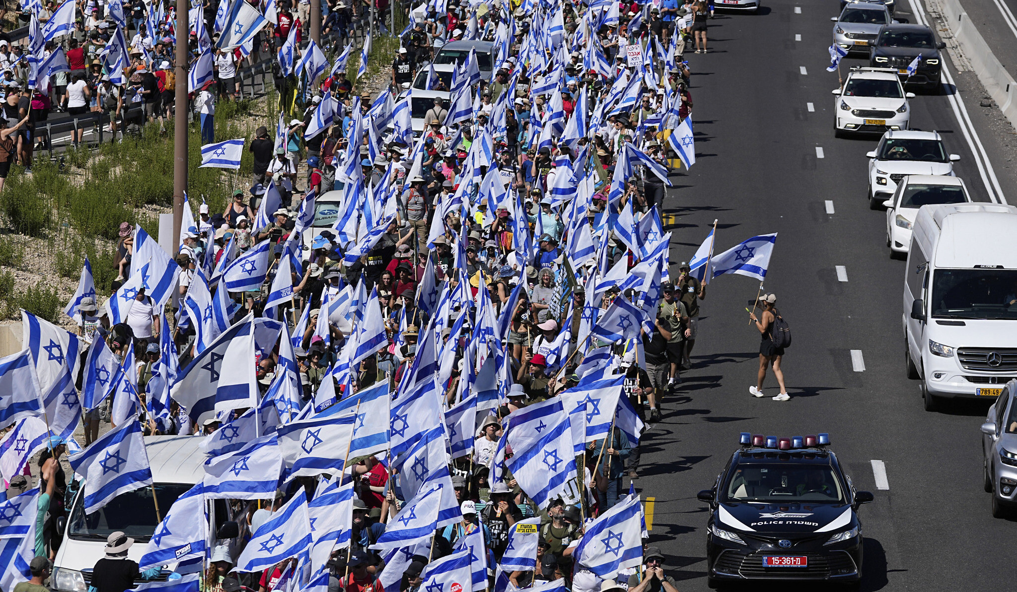 Tens of thousands of Israelis march as vote on judicial curbs nears