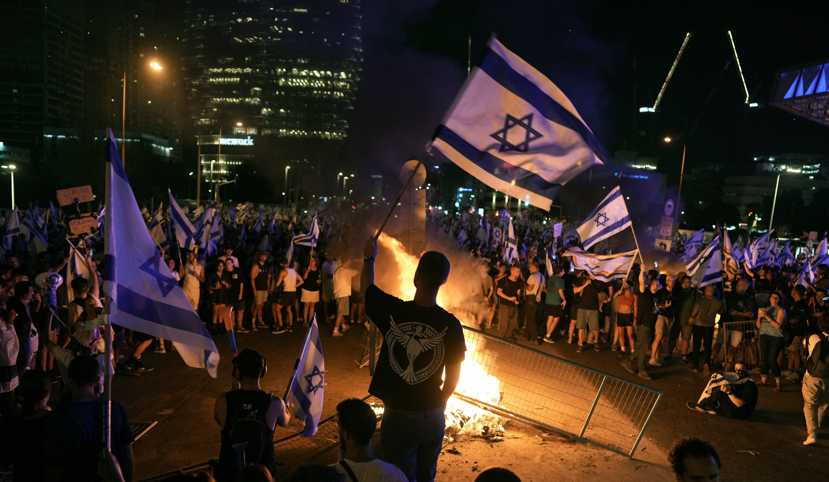 Israelis block main highway in Tel Aviv as judiciary bill passes