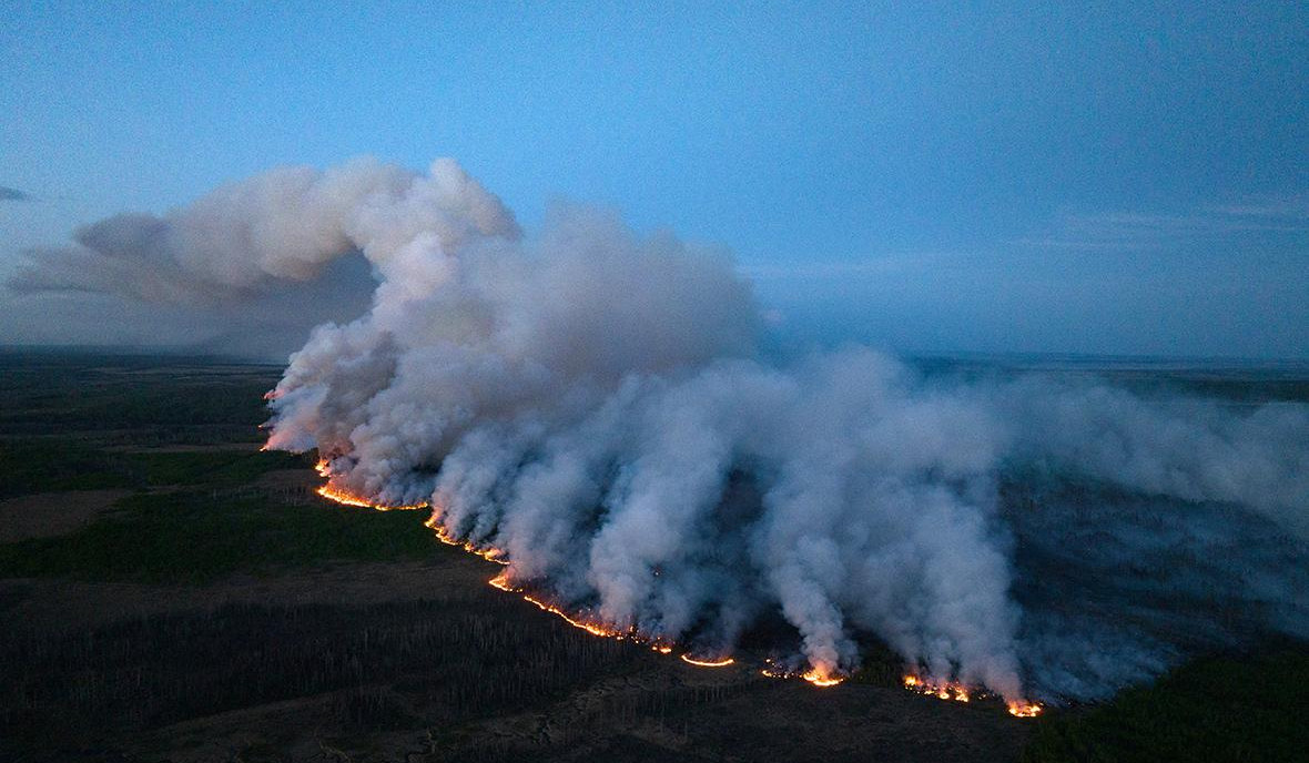 Massive wildfires in Canadian Northwest Territories threaten city, prompting mandatory evacuations