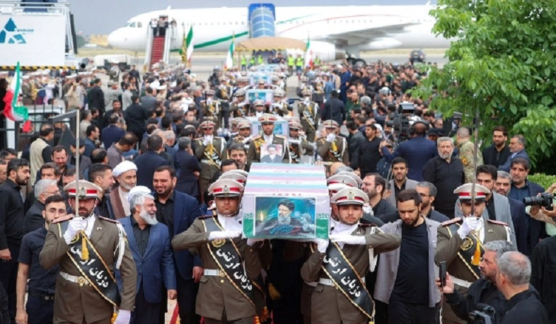 Coffin carrying Iranian president Raisi's body arrives in Mashhad for burial