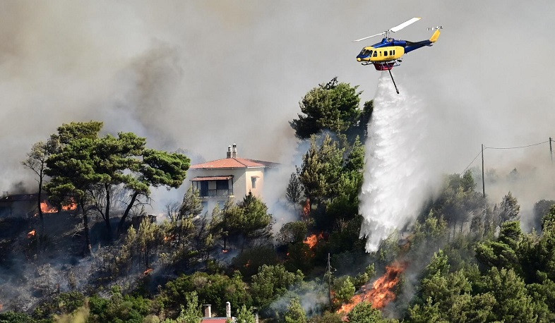 Blazes sweeping near Greece's capital, Athens