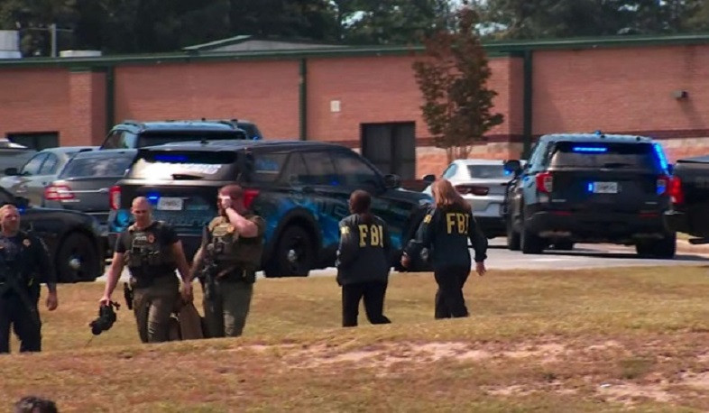 Georgia, US, high school student, 14, kills 4 and wounds 9 in campus shooting