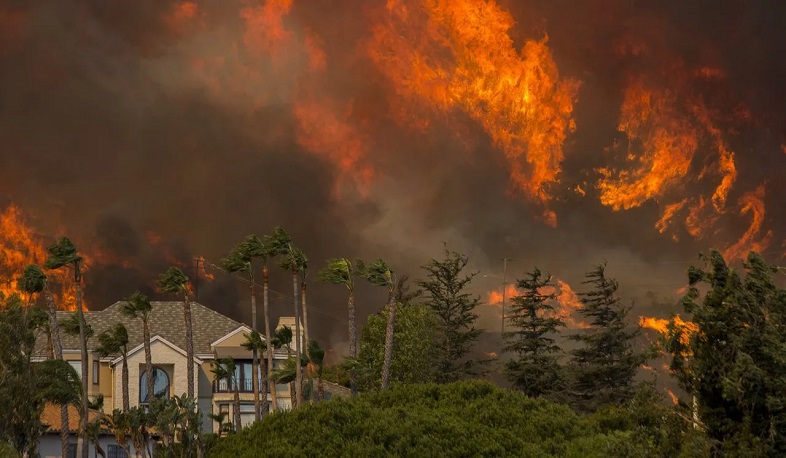 California wildfires burn dozens of homes