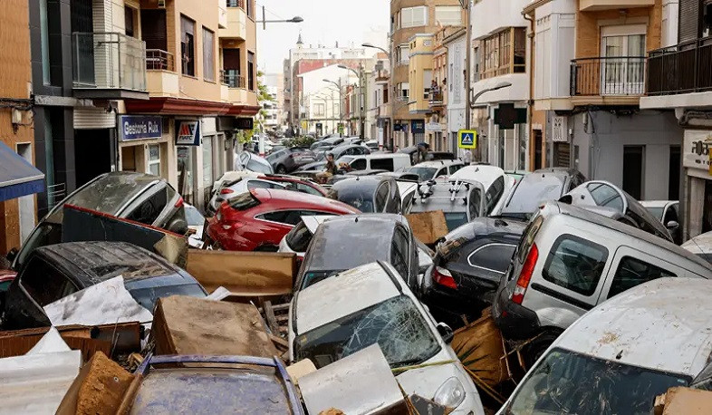 Torrential rains in eastern Spain heighten death toll close to 100