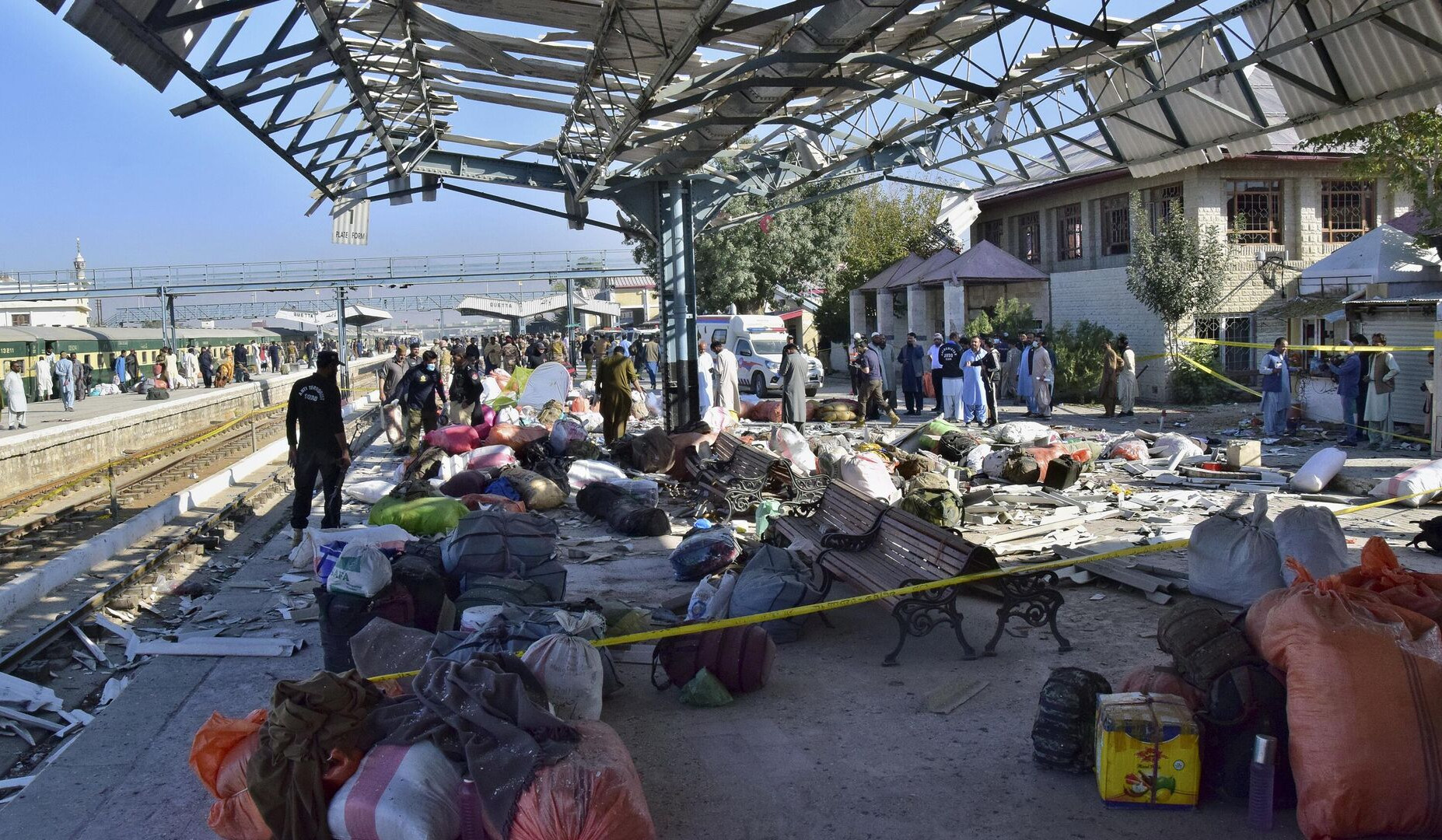 At least 24 killed in Pakistan train station bomb blast, police say