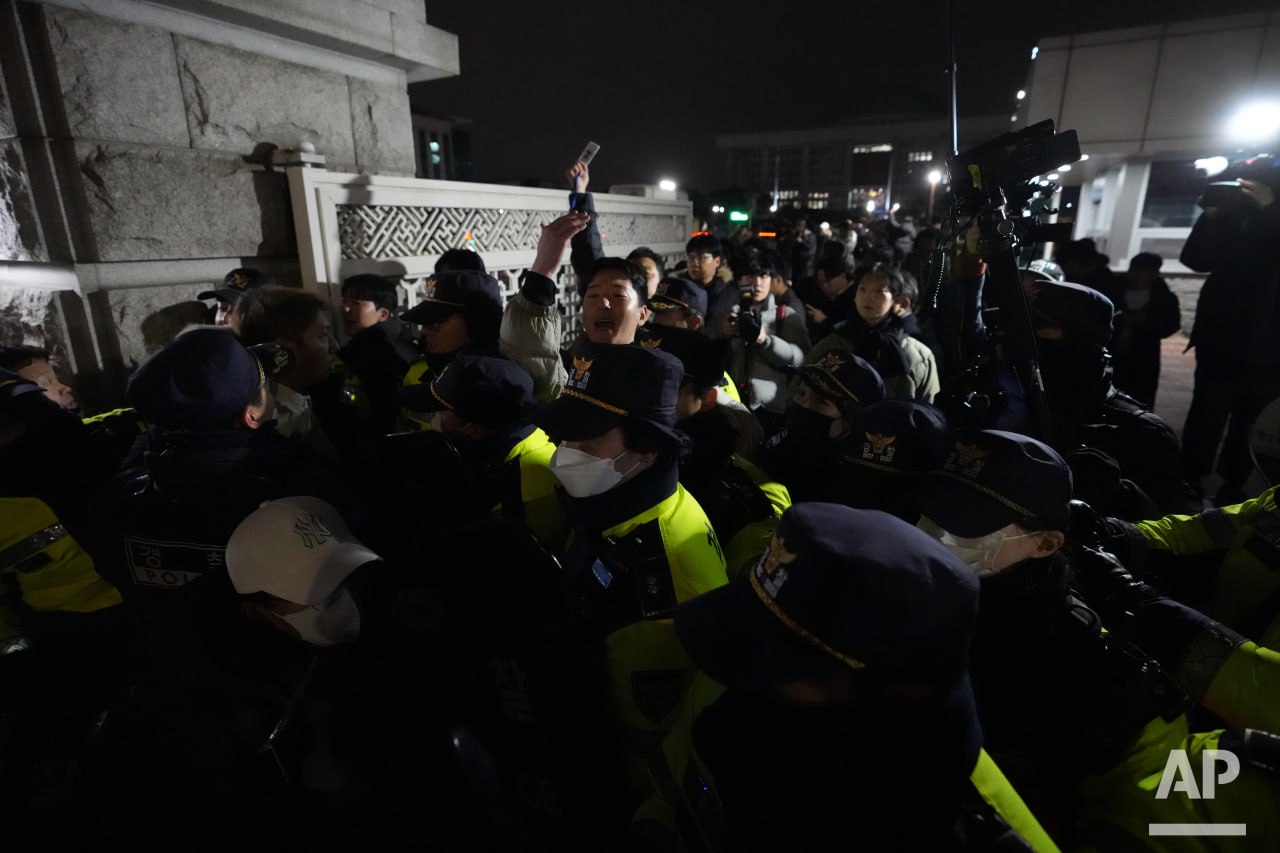 Supporters of South Korea’s opposition party gather outside parliament