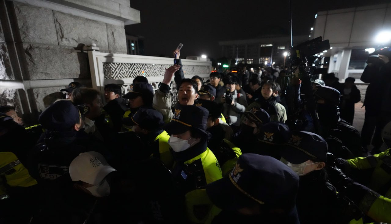 Supporters of South Korea's opposition party gather outside parliament