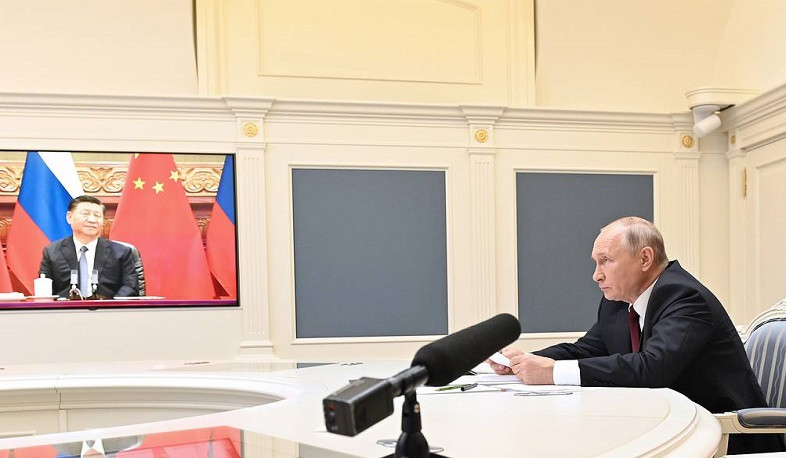 Putin lauds Russian-Chinese ties as example of intergovernmental cooperation