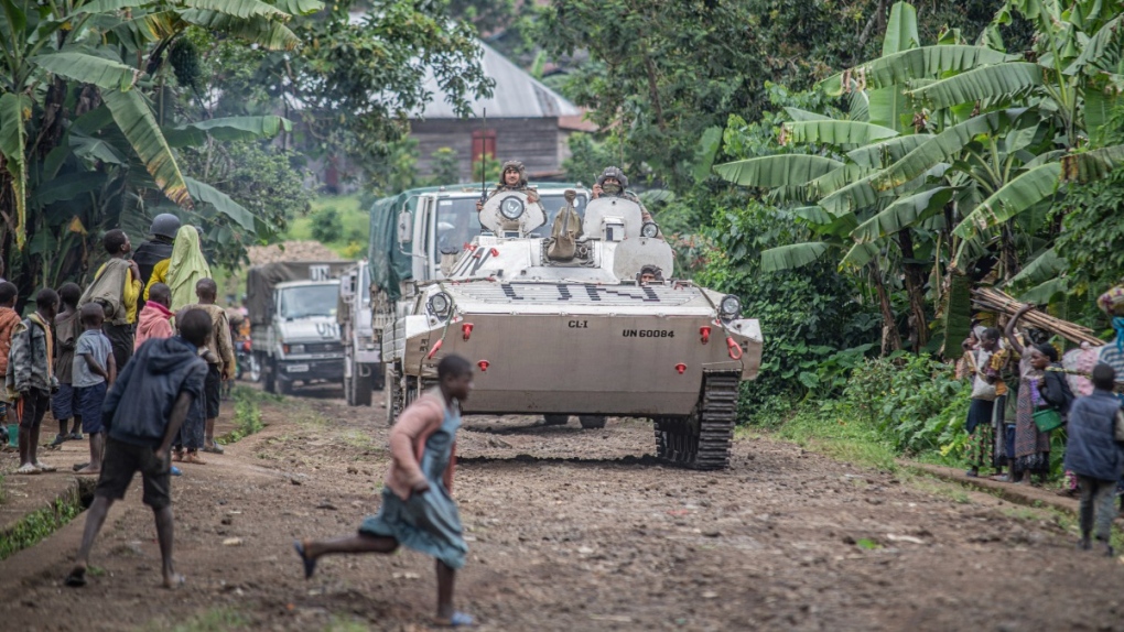 Militia kills at least 60 people at shelter in Congo