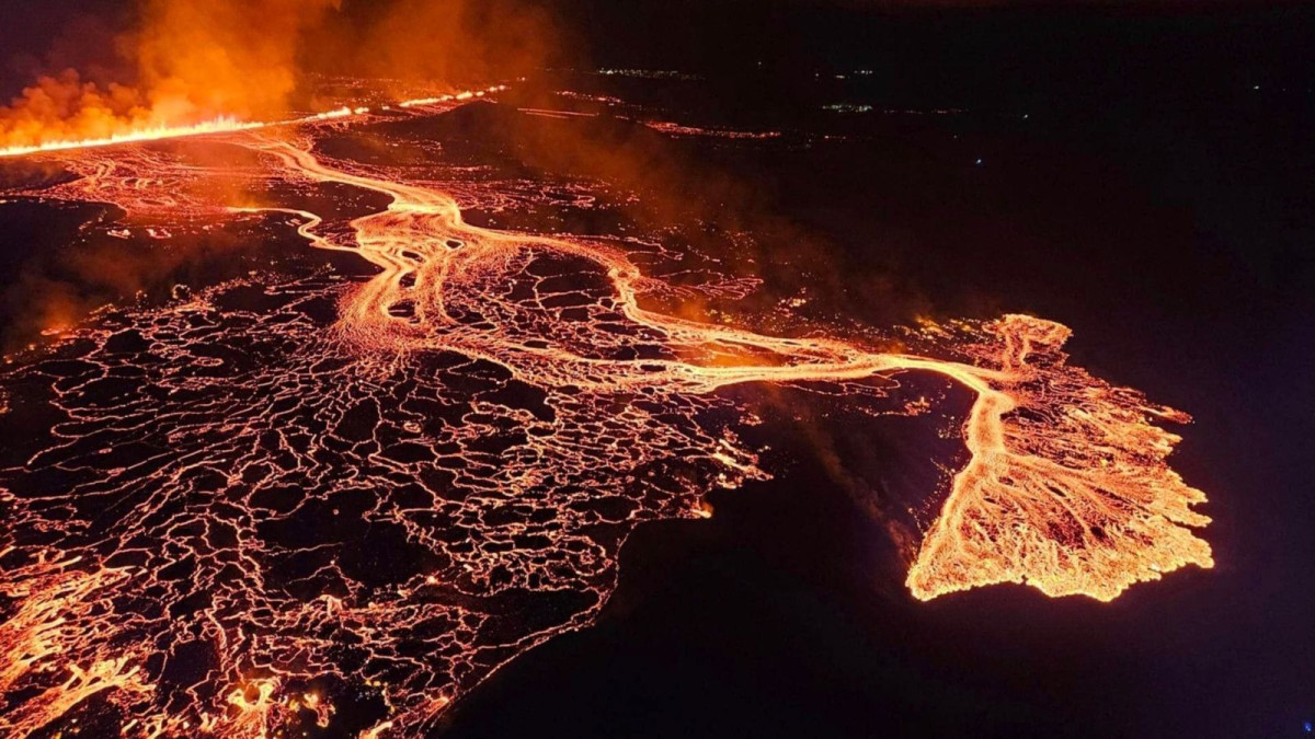 Aerial footage shows Iceland volcano spewing lava at night