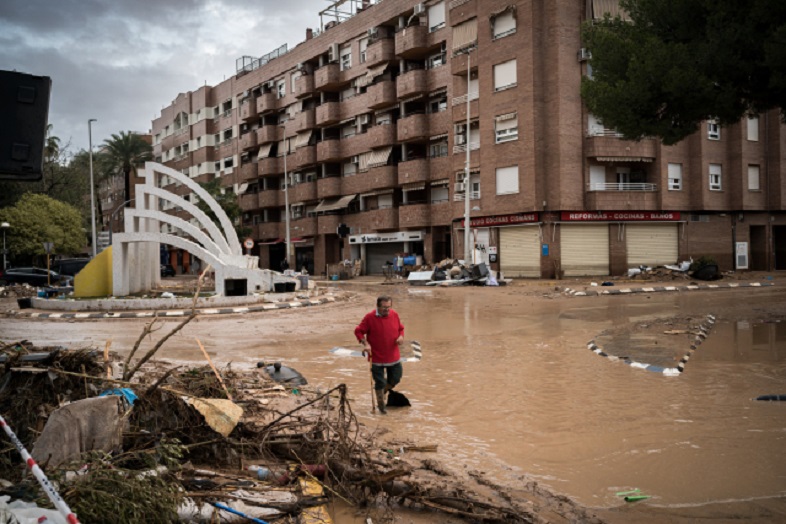 Swollen river, rubbish bin swept away by floodwaters in Spain's Malaga