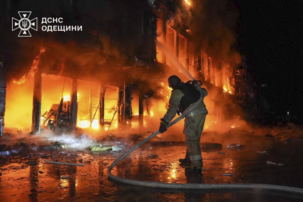 Ukrainian firefighters extinguish blaze after reported drone strike in Odesa