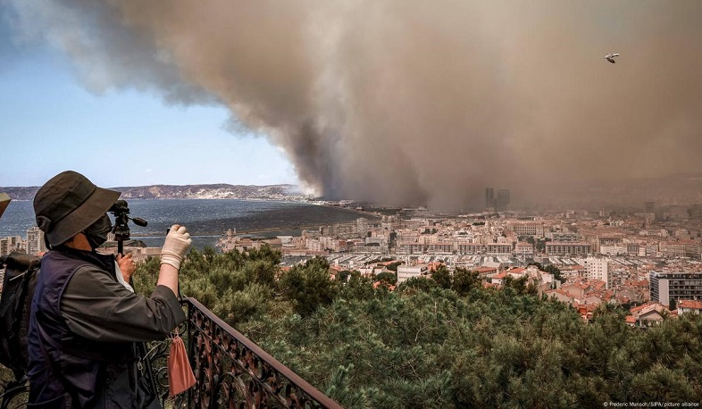 France battles smouldering fire near Marseille, warns of flare-ups