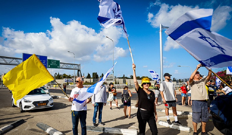 Burning tires block Israeli highway as protesters demand hostage release