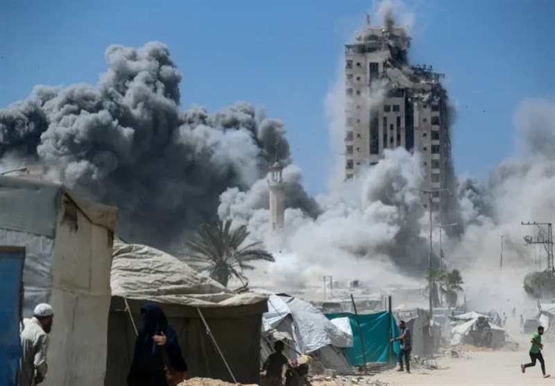 Israeli forces level high-rise building in Gaza City, defense minister says