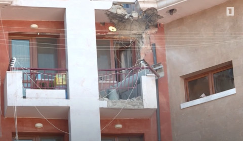 A Smerch missile on the balcony of a residential house