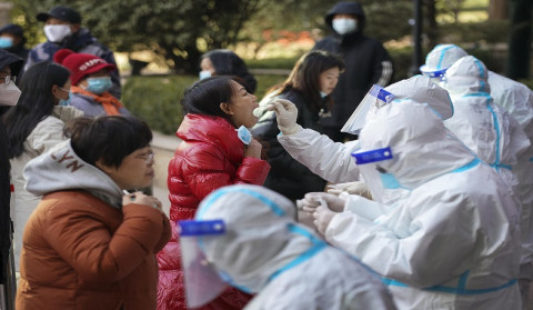China puts city of 6 million under lockdown amid spike, third this week