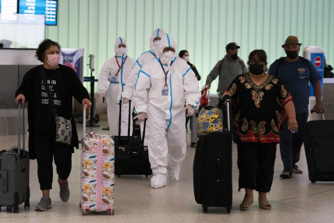 US reports 1st case of omicron variant in returning traveler