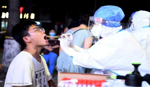 A Chinese city is paying $1,500 to anyone who tests positive for COVID-19