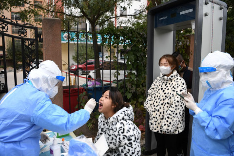 China's Xi'an locks down its 13 mln residents as COVID-19 cases mount