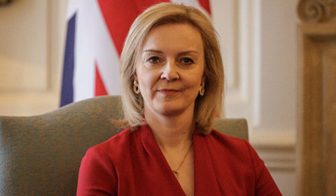Weakened Truss pledges 'to stay the course,' lower tax burden