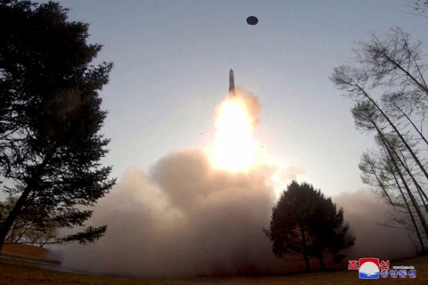 North Korea says tested new solid-fuel ICBM, warns of 'extreme' horror