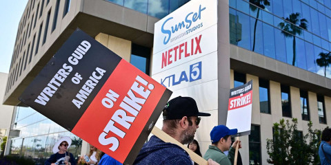 Hollywood writers strike outside Netflix over pay dispute with studios and streamers