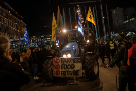 Greek farmers spend the night outside Athens parliament