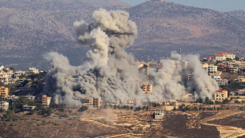 Daylight reveals smoke plumes in Beirut, as Israel keeps up strikes