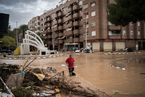 Swollen river, rubbish bin swept away by floodwaters in Spain's Malaga