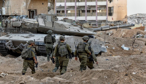 Netanyahu says Israel will control Gaza as aid trucks prepare to enter