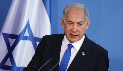 Israeli military recovers bodies of two hostages held by Hamas, prime minister says