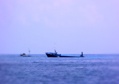 Rescuers retrieve body from water after ferry sinks off Indonesia's Bali coast