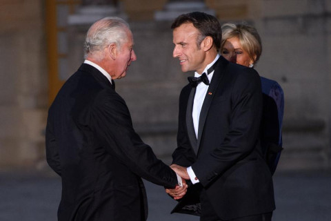 Britain's King Charles welcomes French President Macron to Windsor Castle