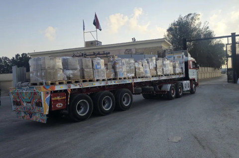Aid trucks in Egypt's Rafah head towards Gaza