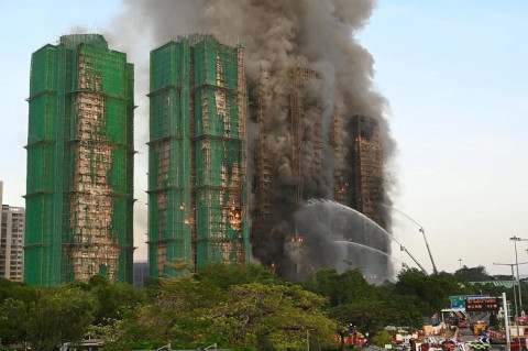 Fire in Hong Kong apartment complex extinguished: BBC