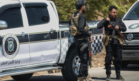 Syrian Kurds hand over new prison to govt troops as truce deadline looms
